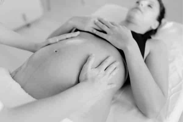 Photograph of a pregnant woman in a birth preparation centre.